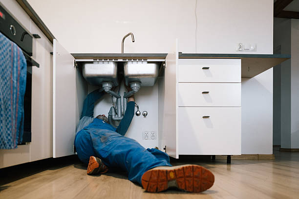 Professional Drain Cleaning technician working in Laquey, MO
